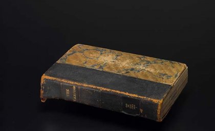 A rare first edition of John Polidori’s The Vampyre. Image: Fryer Library. A book with gilt title.